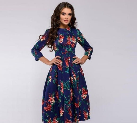 Robe de soirée noire midi femme, style chic et habillé, idéale pour mariage, fête ou événement formel.