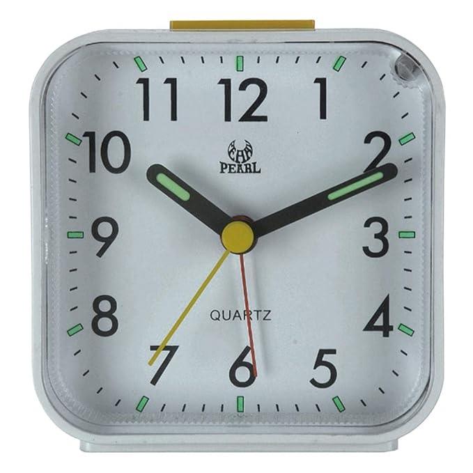 Horloge réveil compacte, portable et silencieuse, sans tic-tac, avec lumière douce et fonction répétition. Idéale pour tous.
