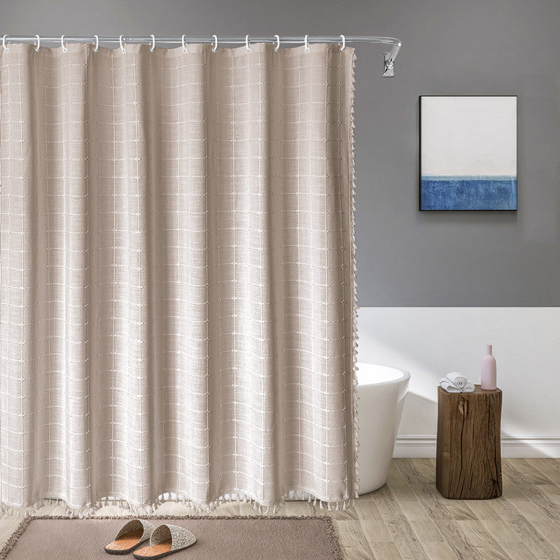 Rideau de douche en lin imperméable style bohème, idéal pour salle de bain moderne.