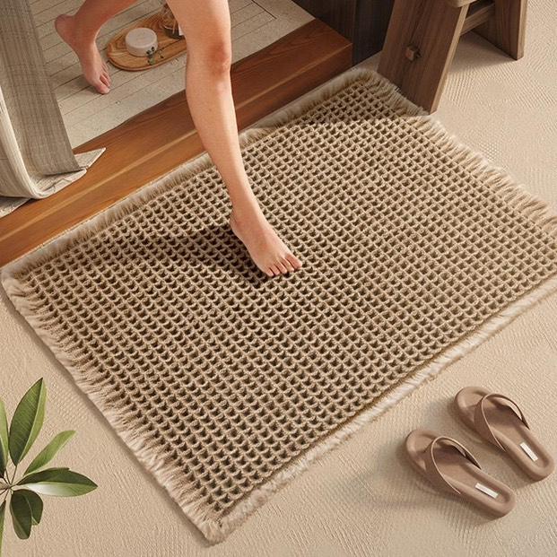 Tapis d'entrée antidérapant gris avec structure gaufre. Idéal intérieur/extérieur couvert, absorbe saleté et humidité.