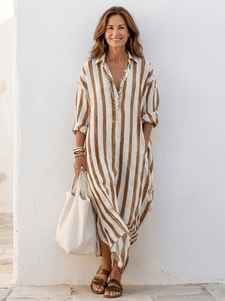 Robe femme printemps-été: modèle rayé ample et confortable, coupe chemise longue, avec poches fonctionnelles.