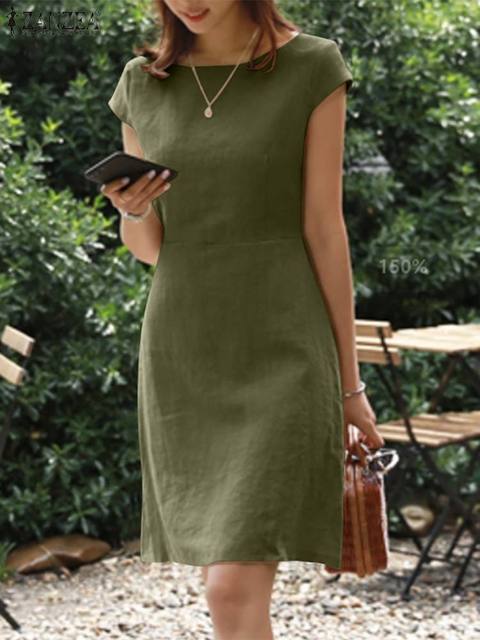 Vue détaillée d'une robe d'été midi pour femme, coupe confortable. Manches courtes, idéale pour les sorties chics.