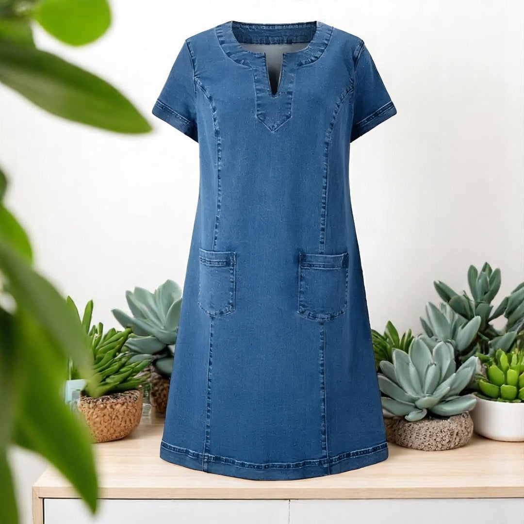 Robe droite midi femme élégante et confortable, avec col V, manches courtes et poches. Look polyvalent printemps.