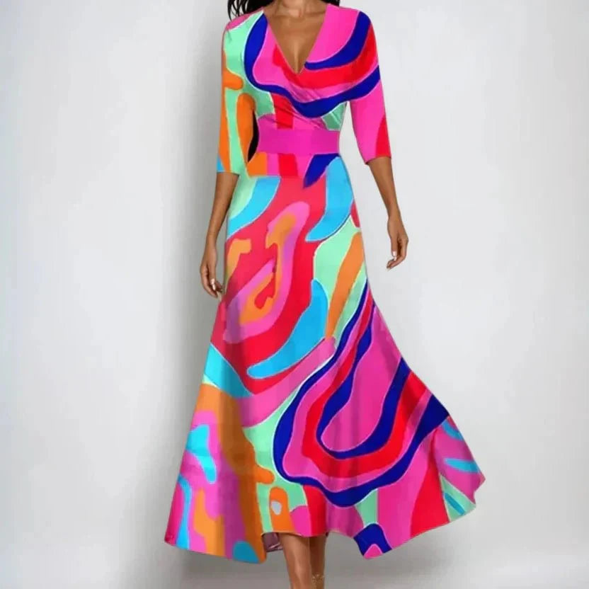 Robe midi femme élégante à motifs floraux, coupe fluide. Sublime pour un style chic et confortable en saison.