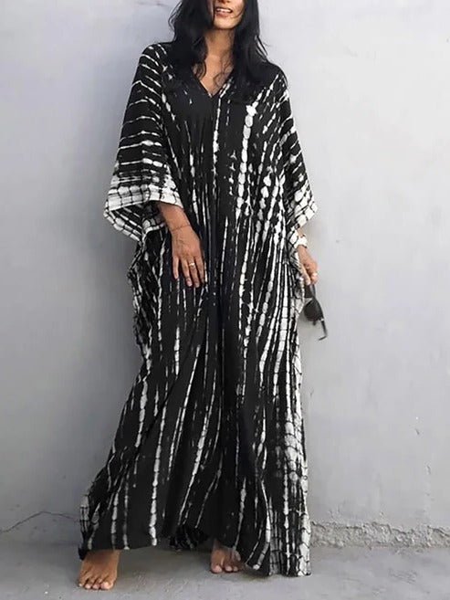 Robe kaftan femme, style estival bohème, fluide et multicolore pour la plage.