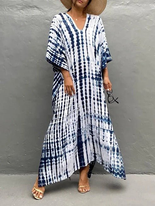 Robe kaftan élégante, coupe maxi fluide, idéale pour l'été et les vacances ensoleillées.