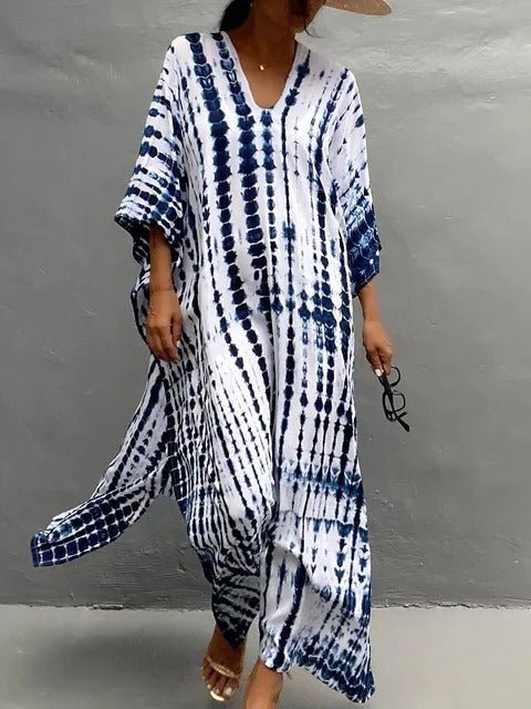 Robe kaftan d'été multicolore, tissu fluide et léger, style bohème décontracté.