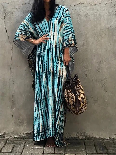 Élégante robe maxi kaftan pour femmes, confort estival et mode plage tendance.
