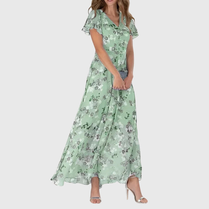 Robe longue évasée fleurie à col en V, style élégant et fluide pour femme, parfaite pour l'été.