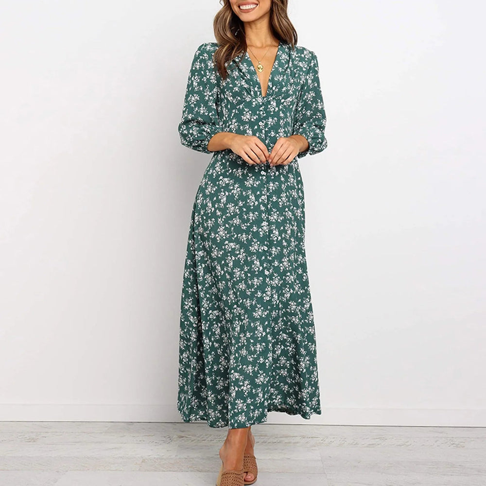 Robe longue fluide fleurie pour femme, imprimé chic. Manches longues et col V élégants, parfaite pour toute occasion.