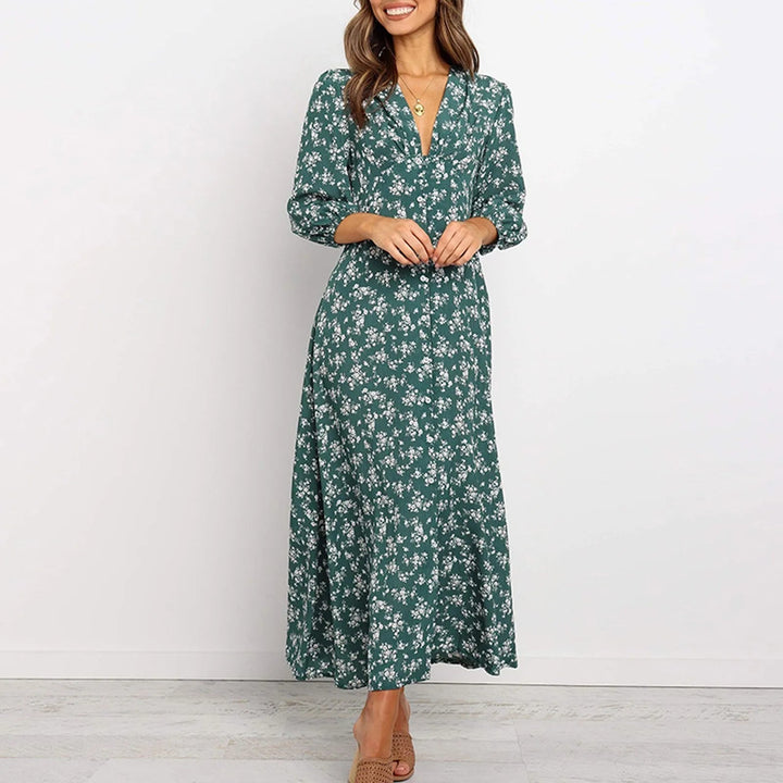 Robe longue fluide fleurie pour femme, imprimé chic. Manches longues et col V élégants, parfaite pour toute occasion.