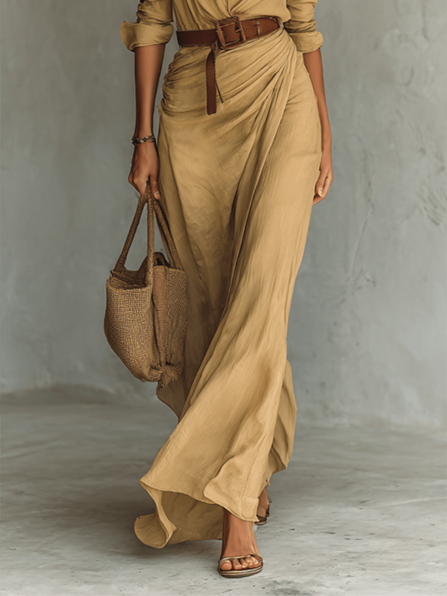 Tenue chic: robe asymétrique élégante pour femmes avec col en V et ceinture, parfaite pour les événements.