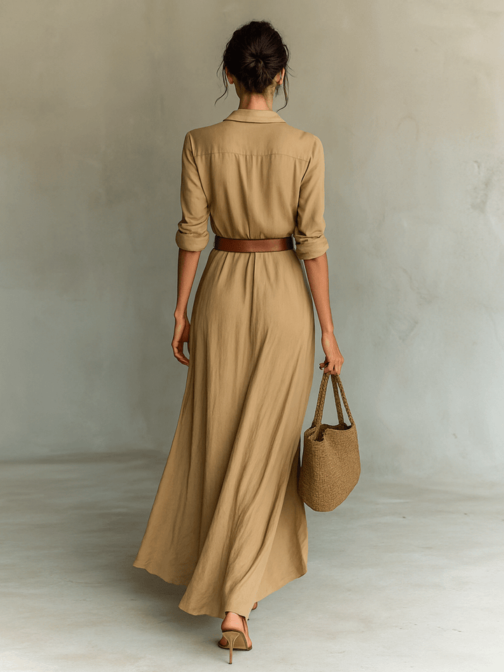 Robe de soirée midi asymétrique à manches longues, avec une ceinture élégante pour un look raffiné et moderne.