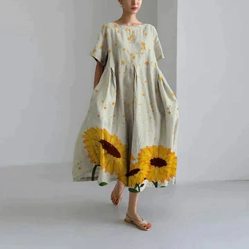 Vêtement féminin : robe fleurie, style chic décontracté, confortable pour l'été et le printemps.