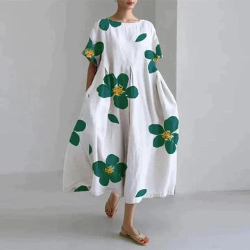 Mode femme : robe florale chic, style élégant et décontracté, coupe fluide pour printemps/été.
