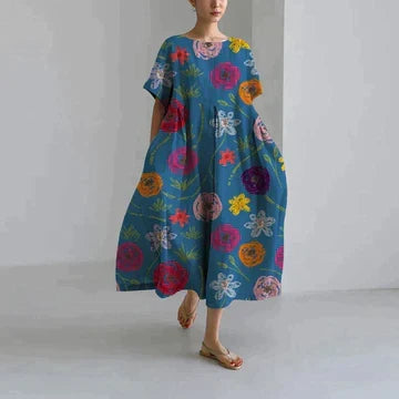 Robe femme à imprimé floral délicat, style décontracté chic, parfaite pour toute occasion estivale.