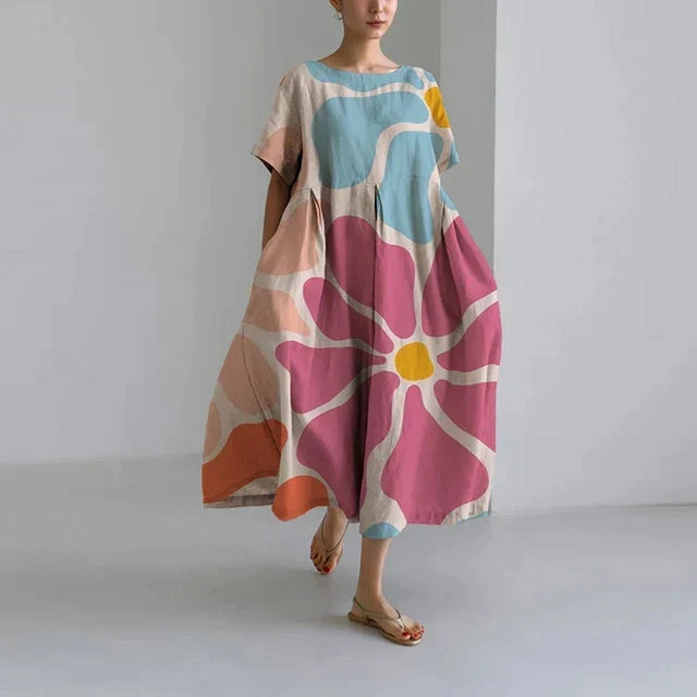 Robe décontractée femme, imprimé floral élégant, idéale pour l'été et le printemps. Vêtement chic.
