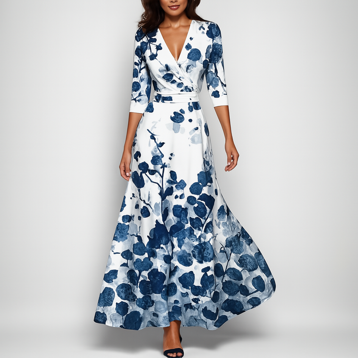 Robe maxi bohème imprimée pour femme, col V et manches 3/4, style estival fluide.