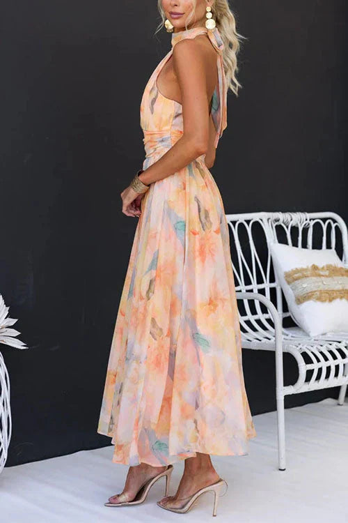 Robe longue dos nu femme à fleurs, style estival élégant et confortable, parfaite pour l'été.