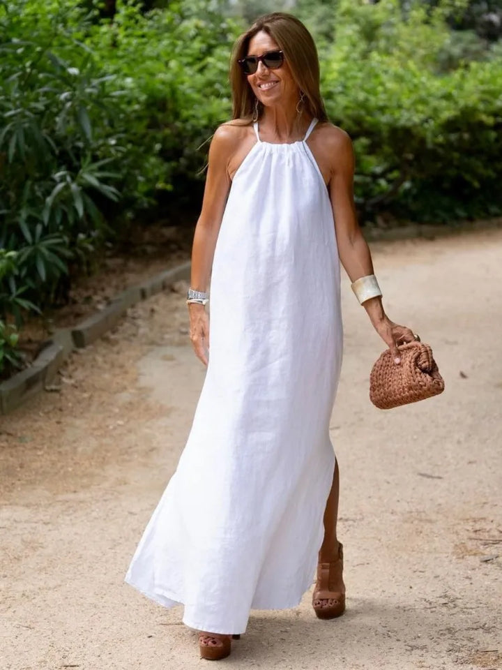Mode été: robe maxi sans manches, dos nu. Vêtement femme élégant et décontracté, coupe fluide trapèze chic.