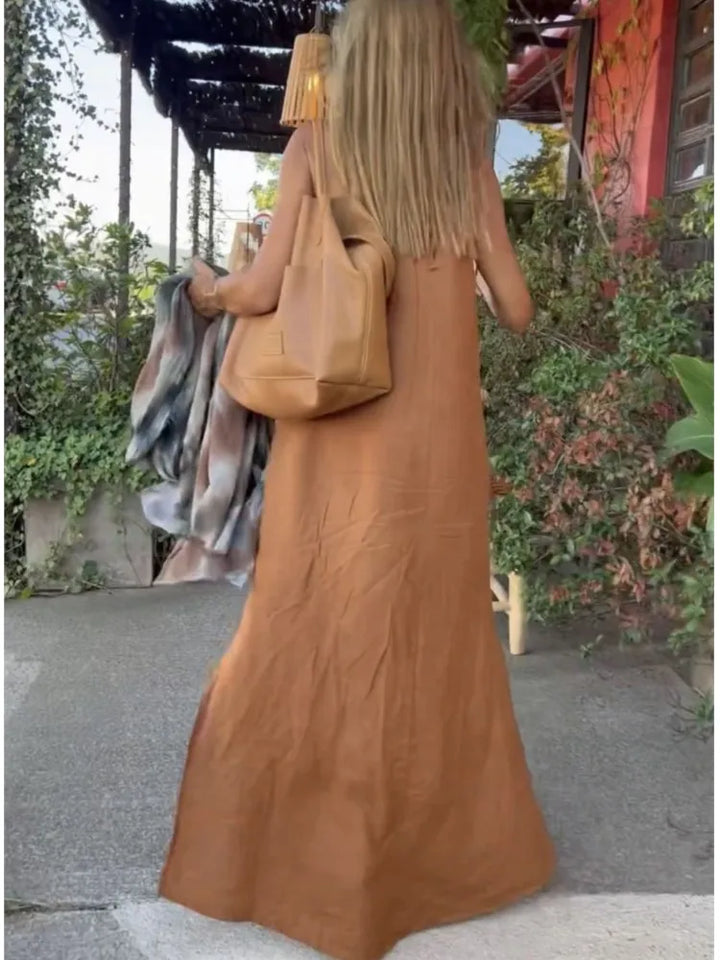 Robe décontractée chic femme, dos nu. Robe longue fluide sans manches, idéale pour look estival quotidien.