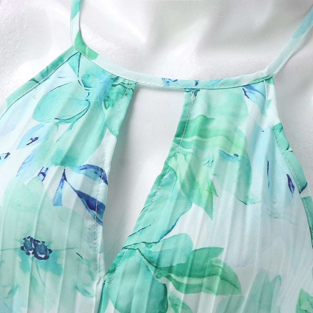 Robe longue femme verte fleurie, légère et fluide, idéale pour un style décontracté chic en été ou vacances.