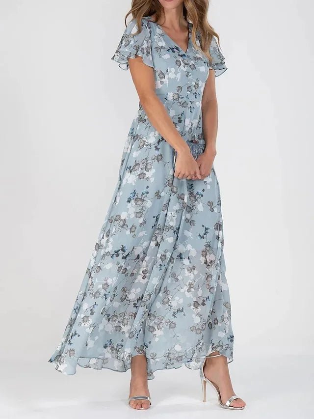 Robe midi femme à imprimé floral vibrant, confortable et tendance. Parfaite pour la mode féminine estivale.