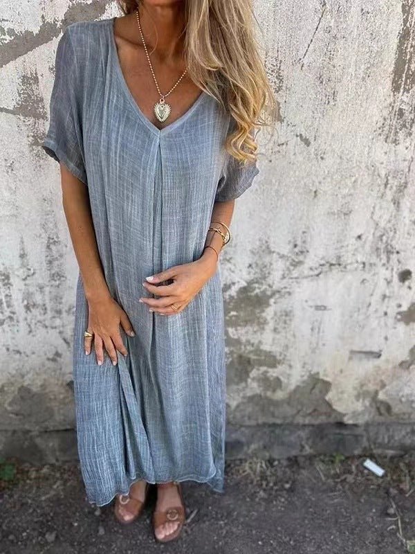 Vêtement femme fluide : robe longue décontractée à col V pour une tenue confortable au printemps ou en été.