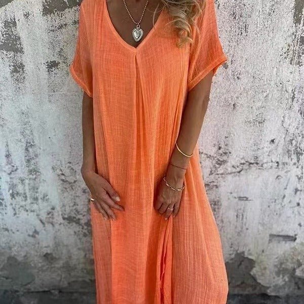 Superbe robe longue femme fluide et élégante à col V, parfaite pour une allure raffinée d'été ou de printemps.