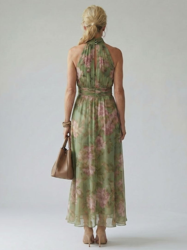 Robe longue fluide pour femme, imprimé floral vert chic, parfaite pour une tenue élégante d'été.