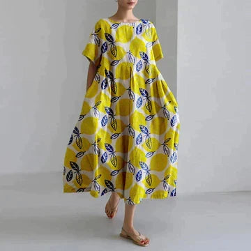 Robe d'été femme à imprimé floral coloré, décontractée et élégante, parfaite pour les beaux jours.