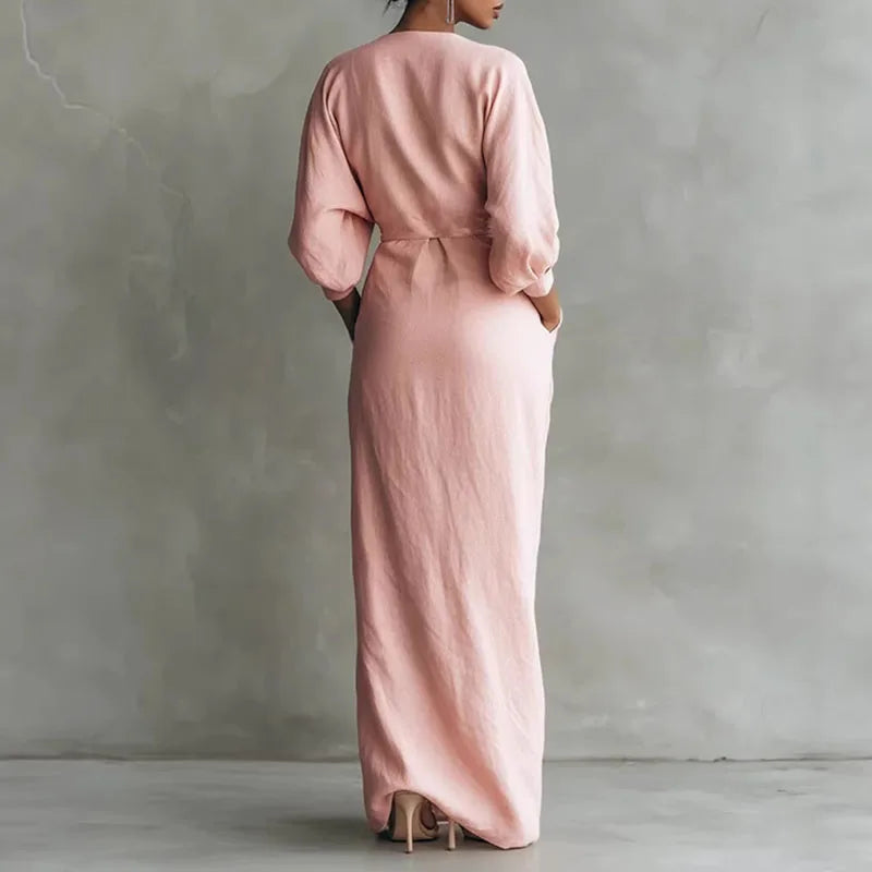 Robe portefeuille longue femme avec col V et manches bouffantes, très élégante. Parfaite pour une allure chic.