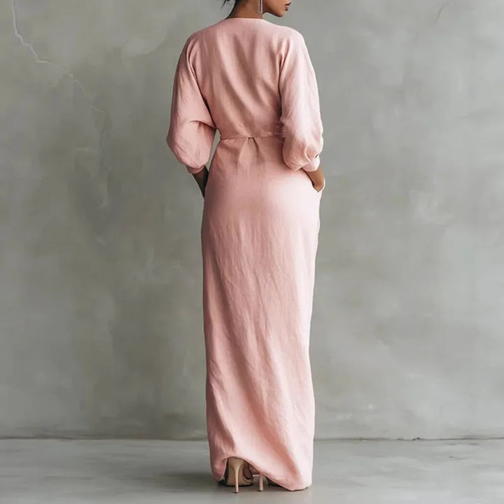 Robe portefeuille longue femme avec col V et manches bouffantes, très élégante. Parfaite pour une allure chic.