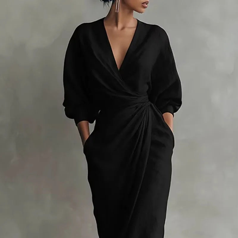 Robe longue femme, coupe portefeuille fluide et élégante. Parfaite pour un look chic et tendance printemps-été.