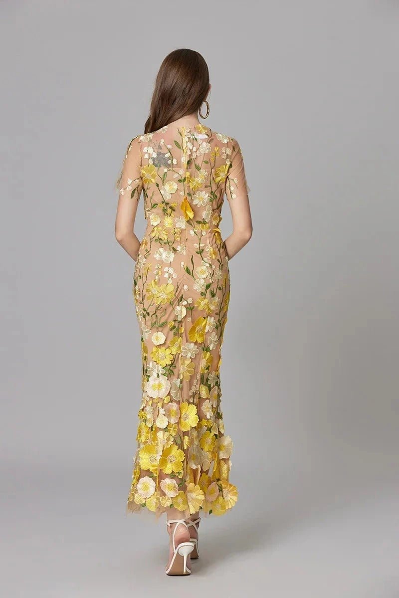 Robe florale sans manches, coupe longue, parfaite pour printemps/été.
