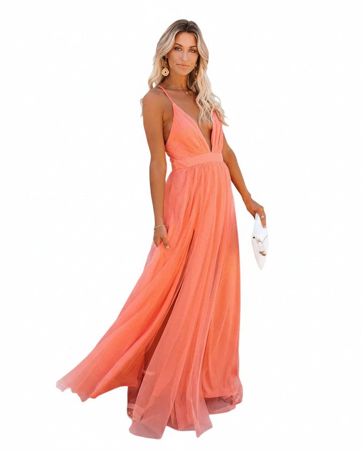 Robe maxi fluide femme élégante, décolleté plongeant et dos nu. Idéale pour soirées et événements.