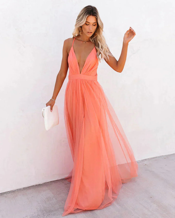 Robe élégante femme style maxi fluide avec décolleté plongeant et dos nu. Idéale pour grandes occasions.
