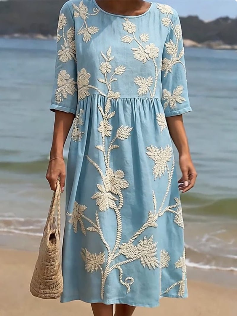 Robe midi fleurie brodée femme, manches trois-quarts, style décontracté chic, confortable pour toutes tailles.
