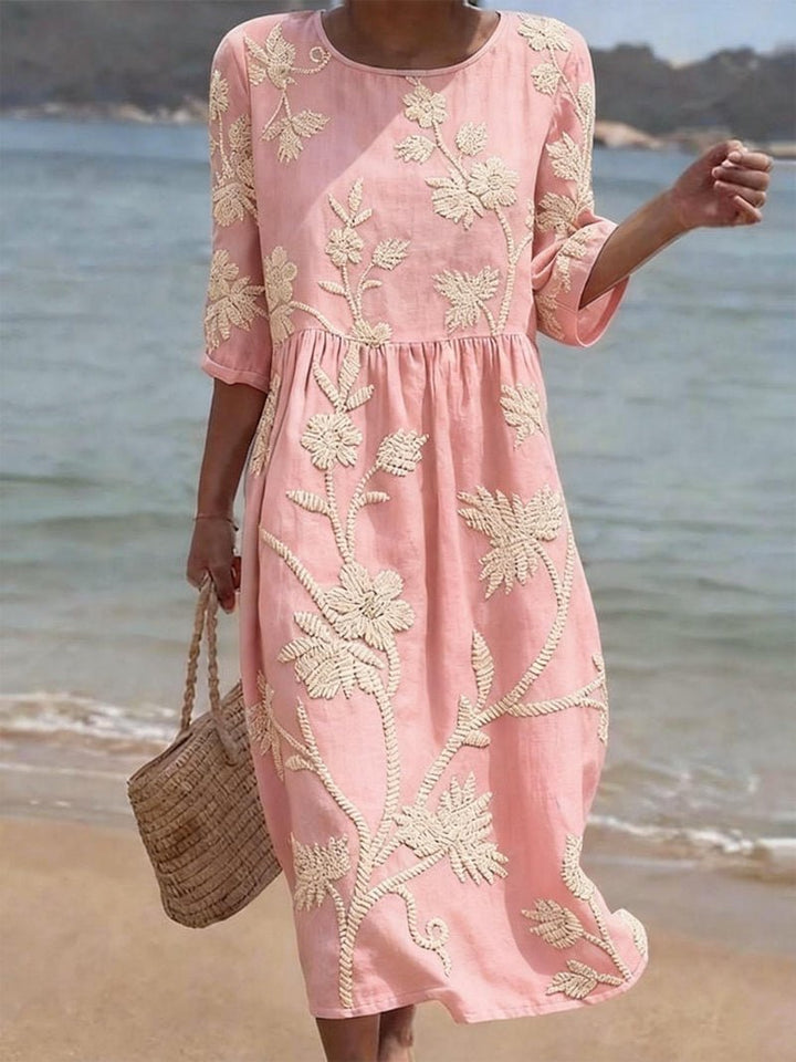 Élégante robe midi florale brodée pour femme, parfaite pour le quotidien ou une occasion spéciale, style intemporel.