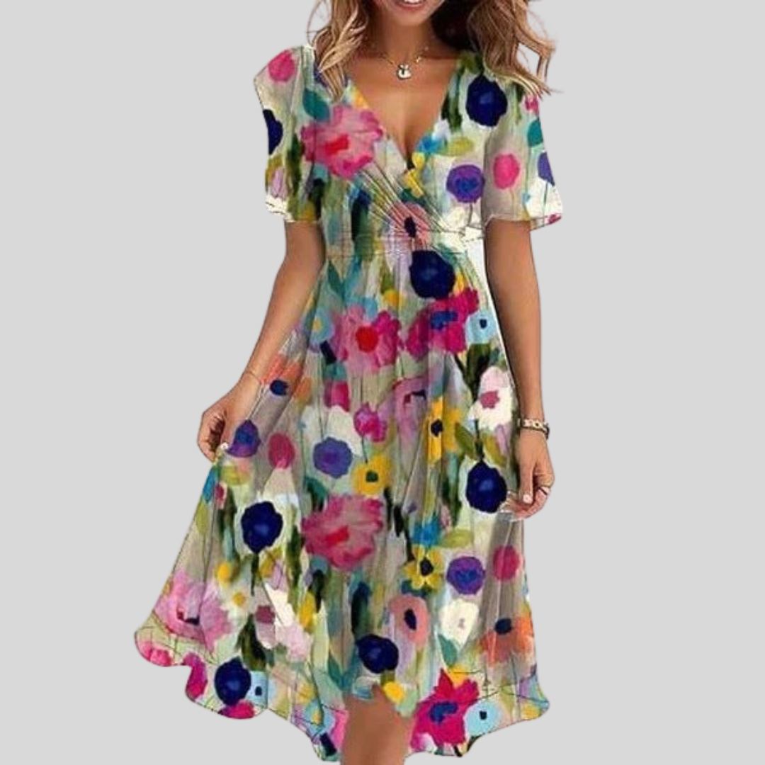 Robe midi femme mode été, coupe flatteuse évasée, col V. Confortable et chic pour un style féminin impeccable.