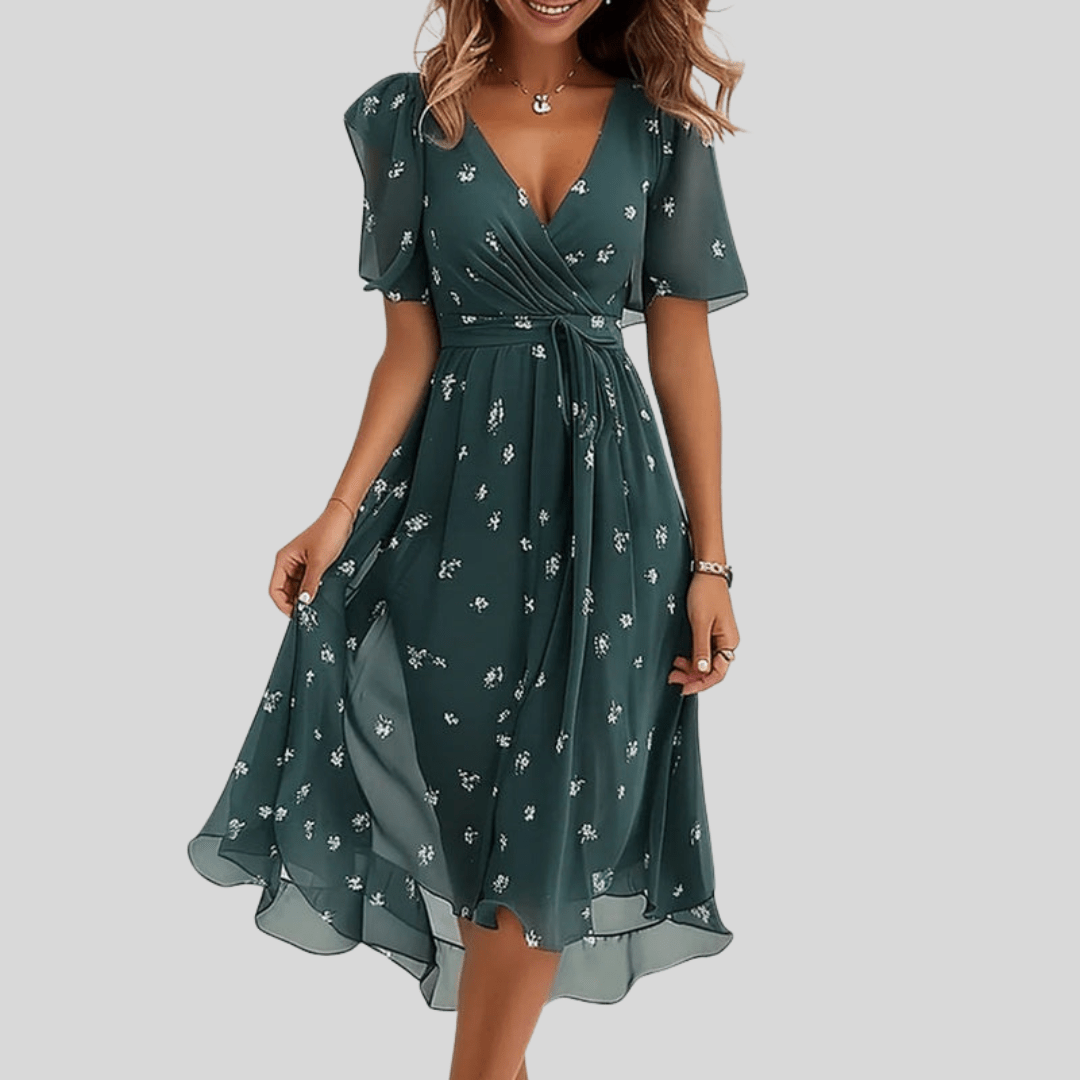 Vêtement femme chic: robe midi évasée col V, élégante et confortable, idéale pour journée ou soirée d'été.