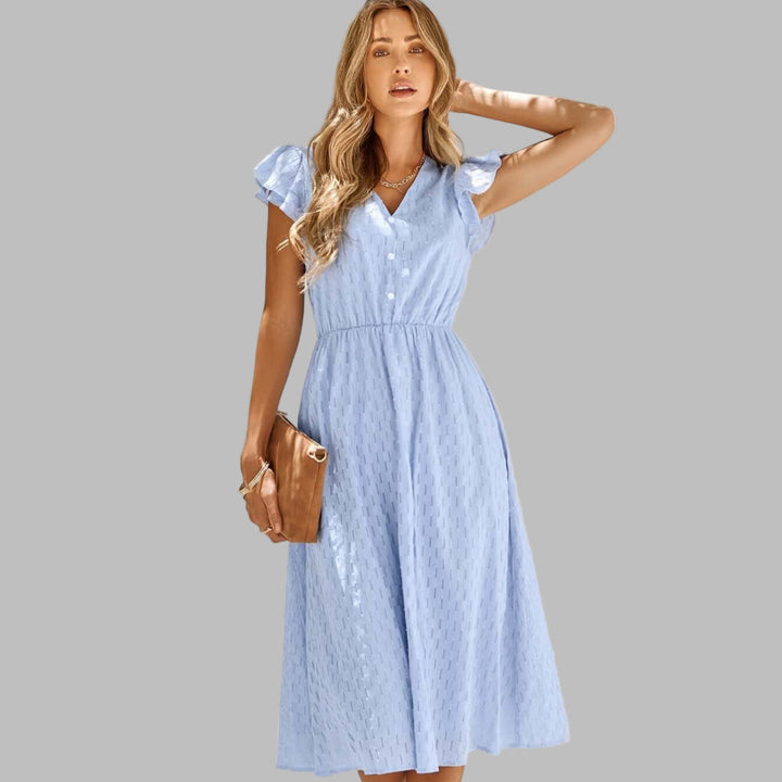 Robe midi fluide femme avec col en V et volants. Idéale pour un look décontracté chic ou habillé.
