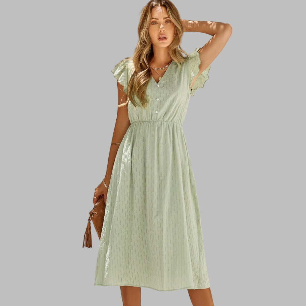 Robe midi fluide à volants pour femme, style printemps-été. Élégance décontractée et liberté de mouvement.