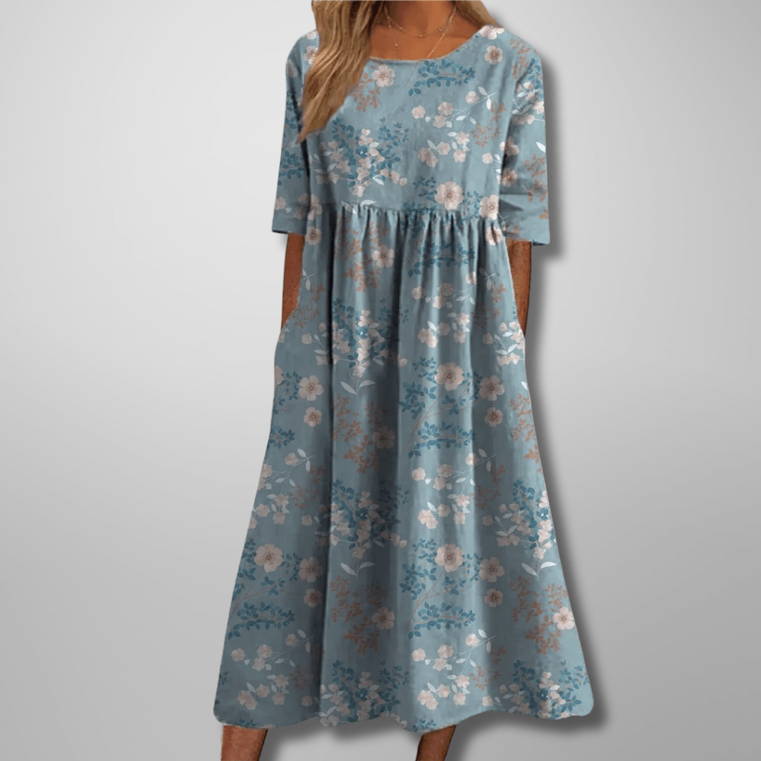 Robe midi décontractée imprimée à col rond, manches courtes, confort et style pour femme en été.