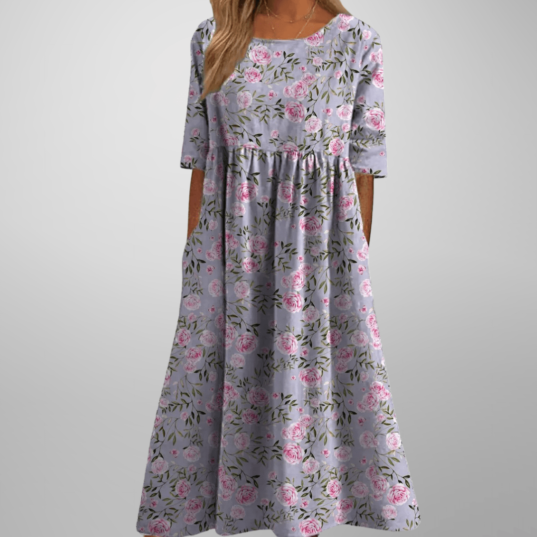 Robe midi imprimée mode féminine, col rond, manches courtes, style chic pour toutes occasions.