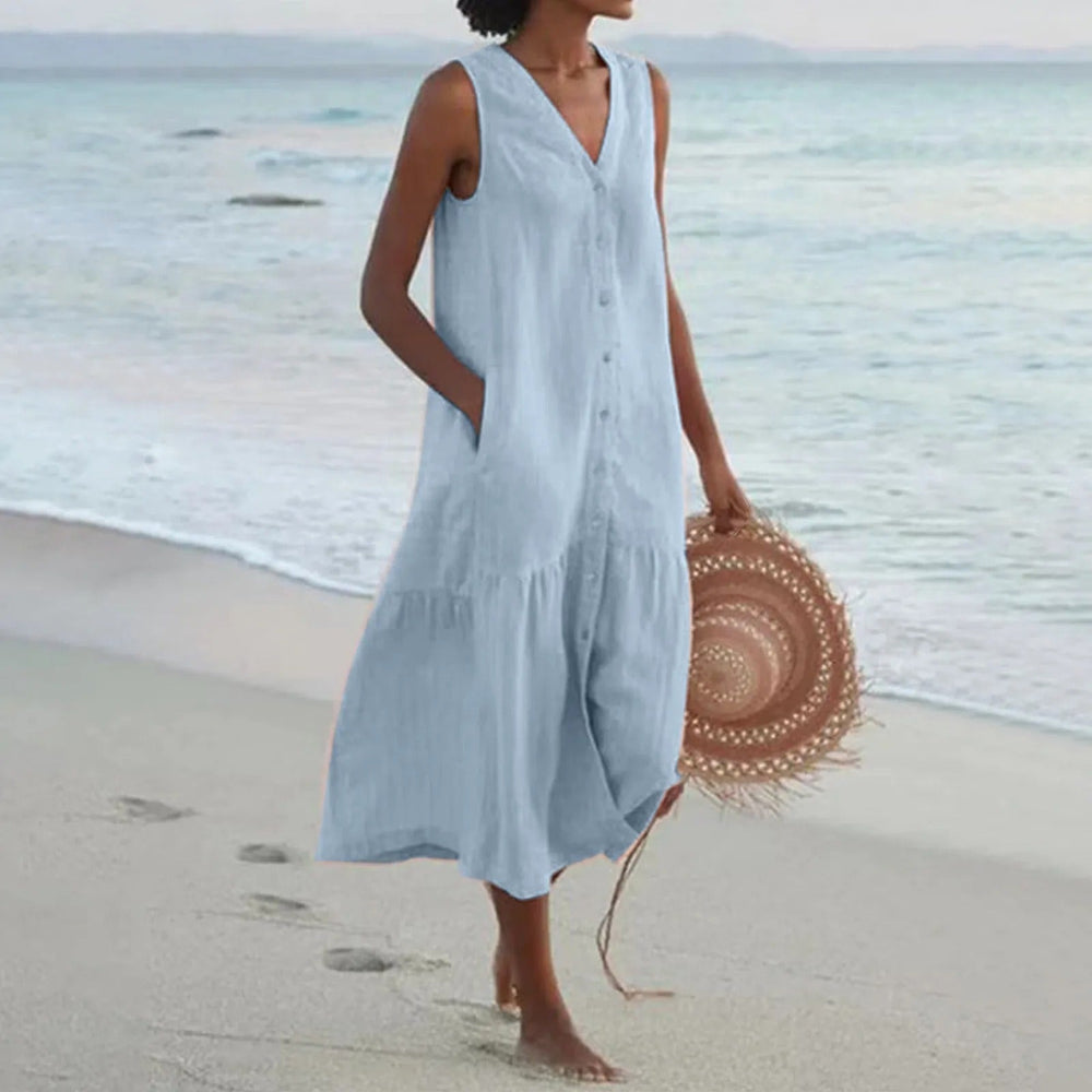 Robe midi d'été femme boutonnée, fluide et décontractée, avec poches, coupe sans manches.