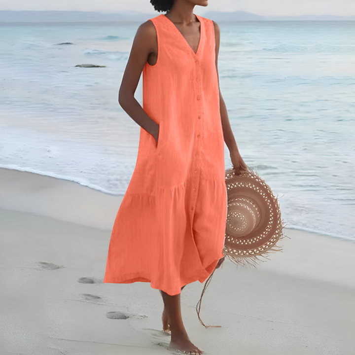 Robe d'été midi femme fluide et confortable, coupe sans manches et col en V, style décontracté chic.