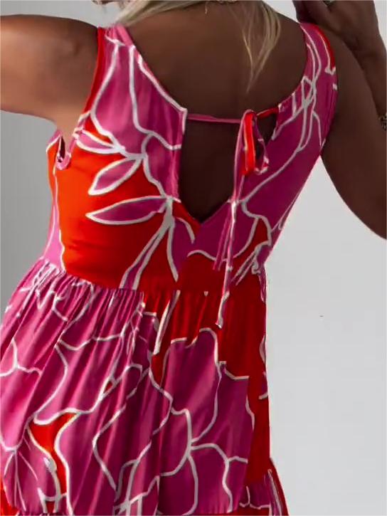 Robe d'été midi trapèze fleurie pour femme. Élégante, fluide et confortable, idéale pour toutes les occasions.