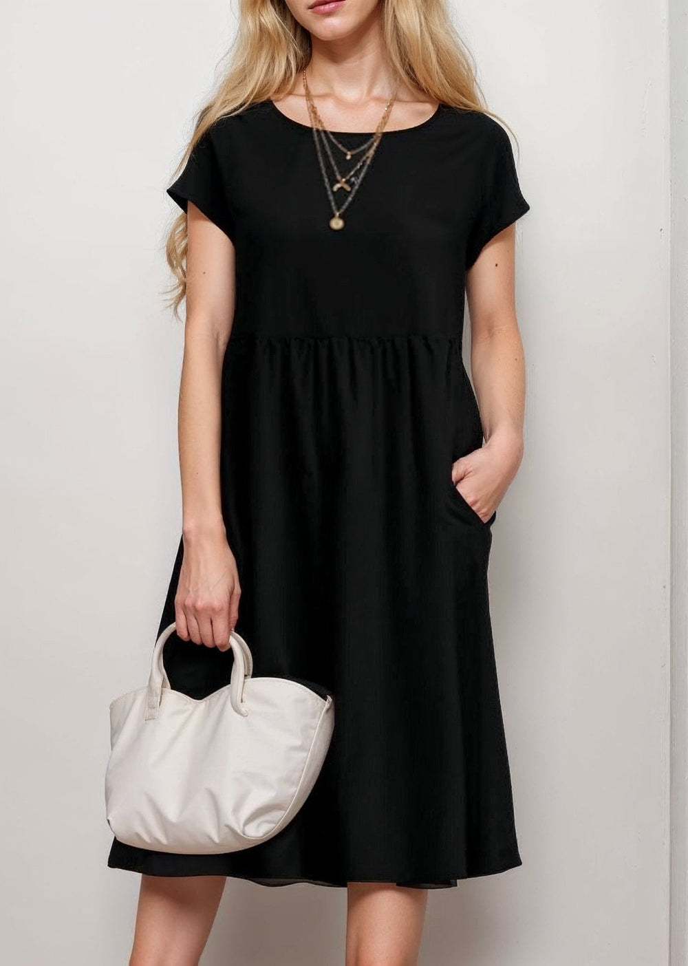 Robe midi trapèze confortable et polyvalente pour femme, manches courtes, idéale pour le quotidien ou l'été.