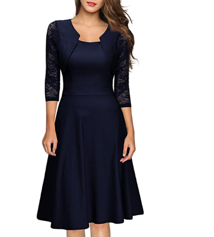 Robe midi trapèze avec empiècements fins et manches 3/4 pour femme. Un choix élégant et intemporel.